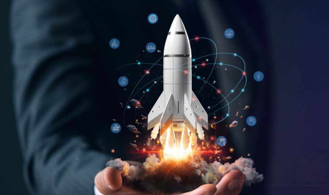 Startup, hand shows a rocket and icons Startup, hand shows a rocket and icons