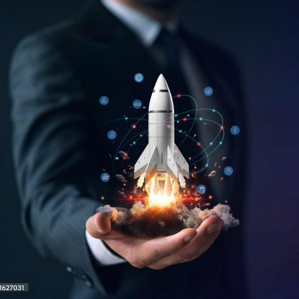 Startup, hand shows a rocket and icons